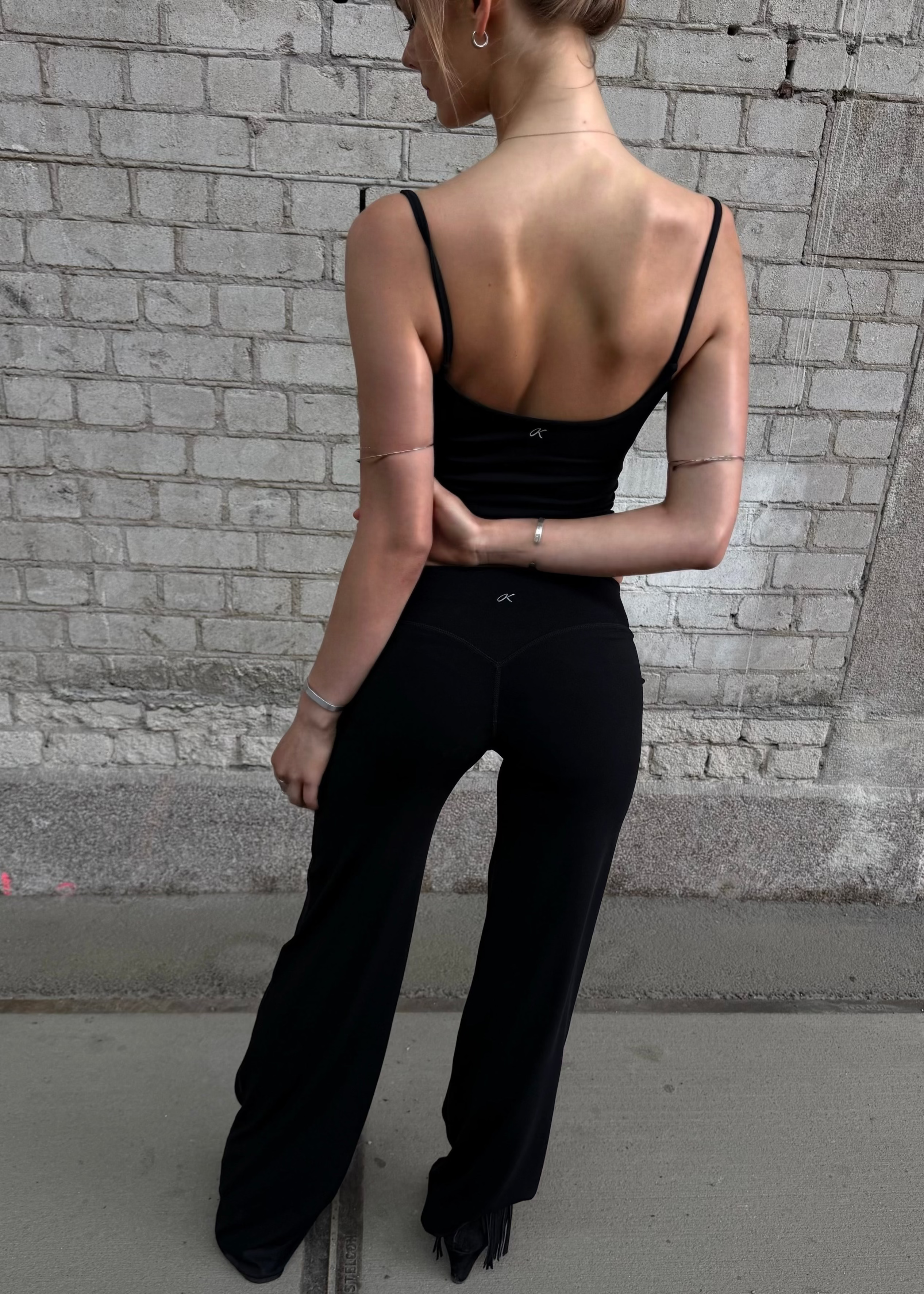Model is wearing Wide leg pants in Tall 